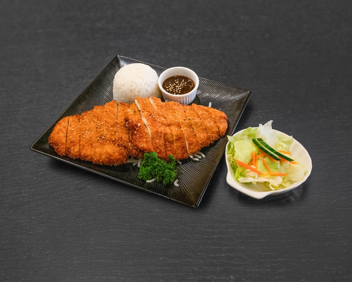 DT11 Don Katsu — pork or chicken cutlet with special sauce, salad & rice